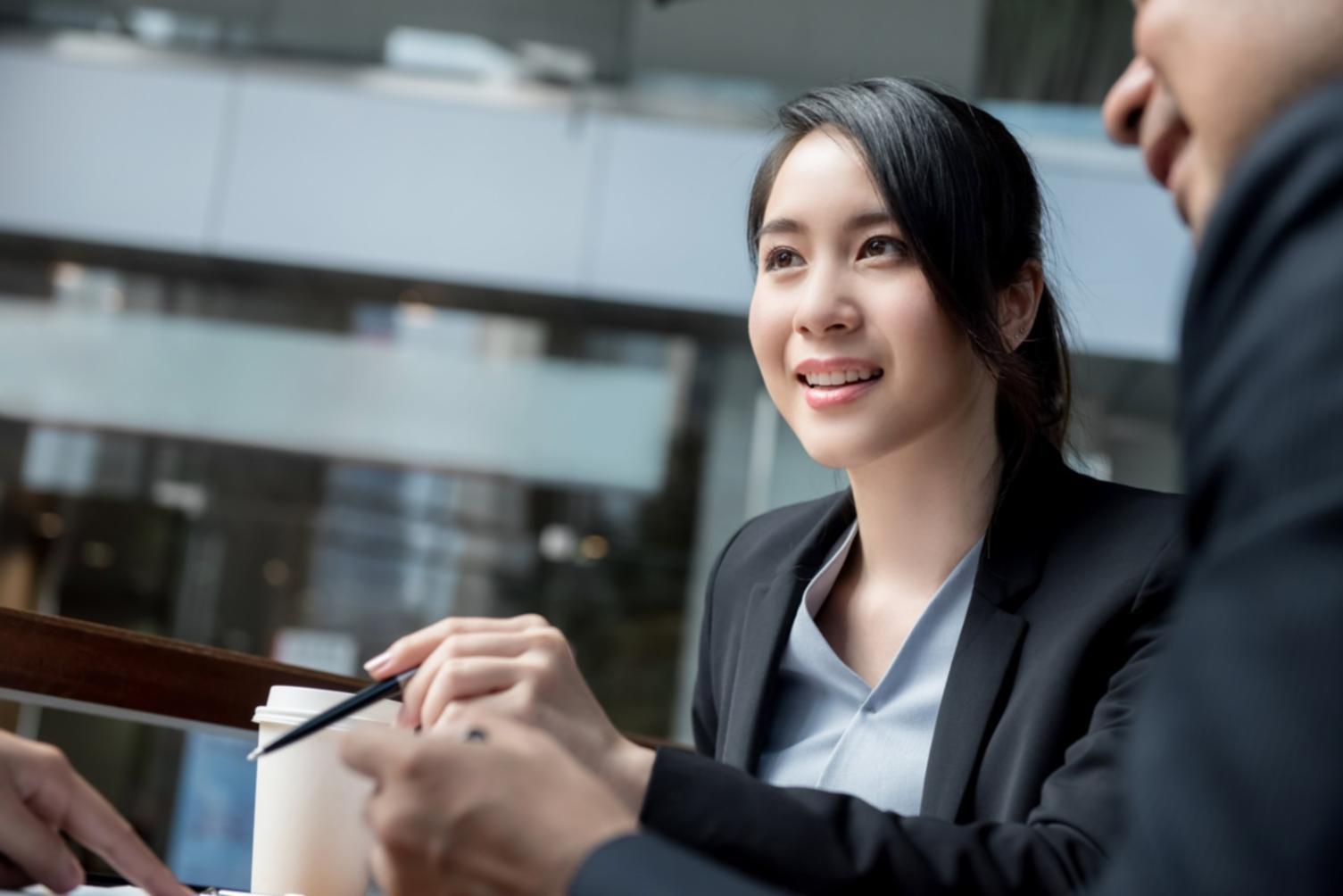 Students reviewing budget planning materials