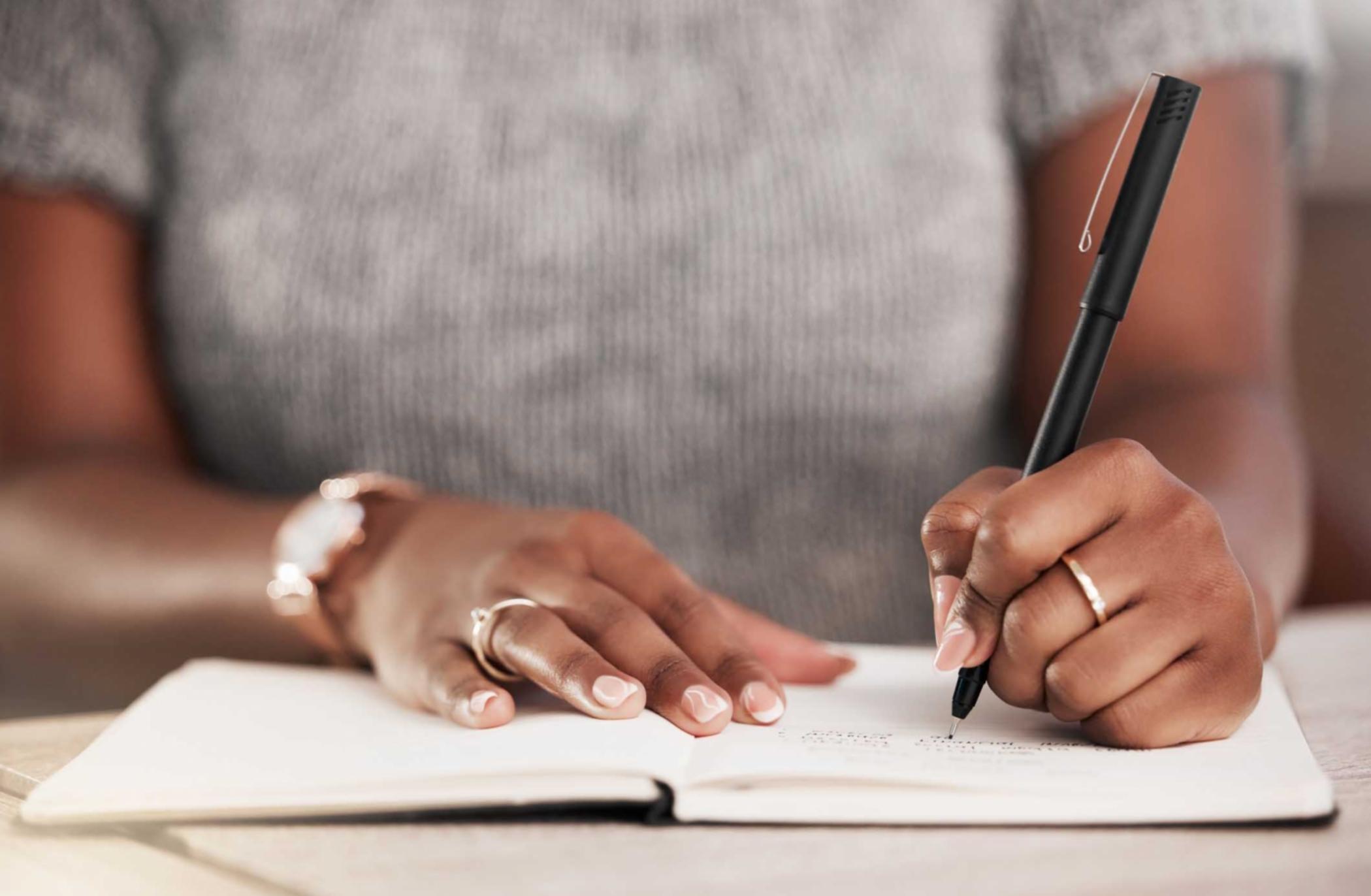 Small group workshop session with participants working on financial planning exercises